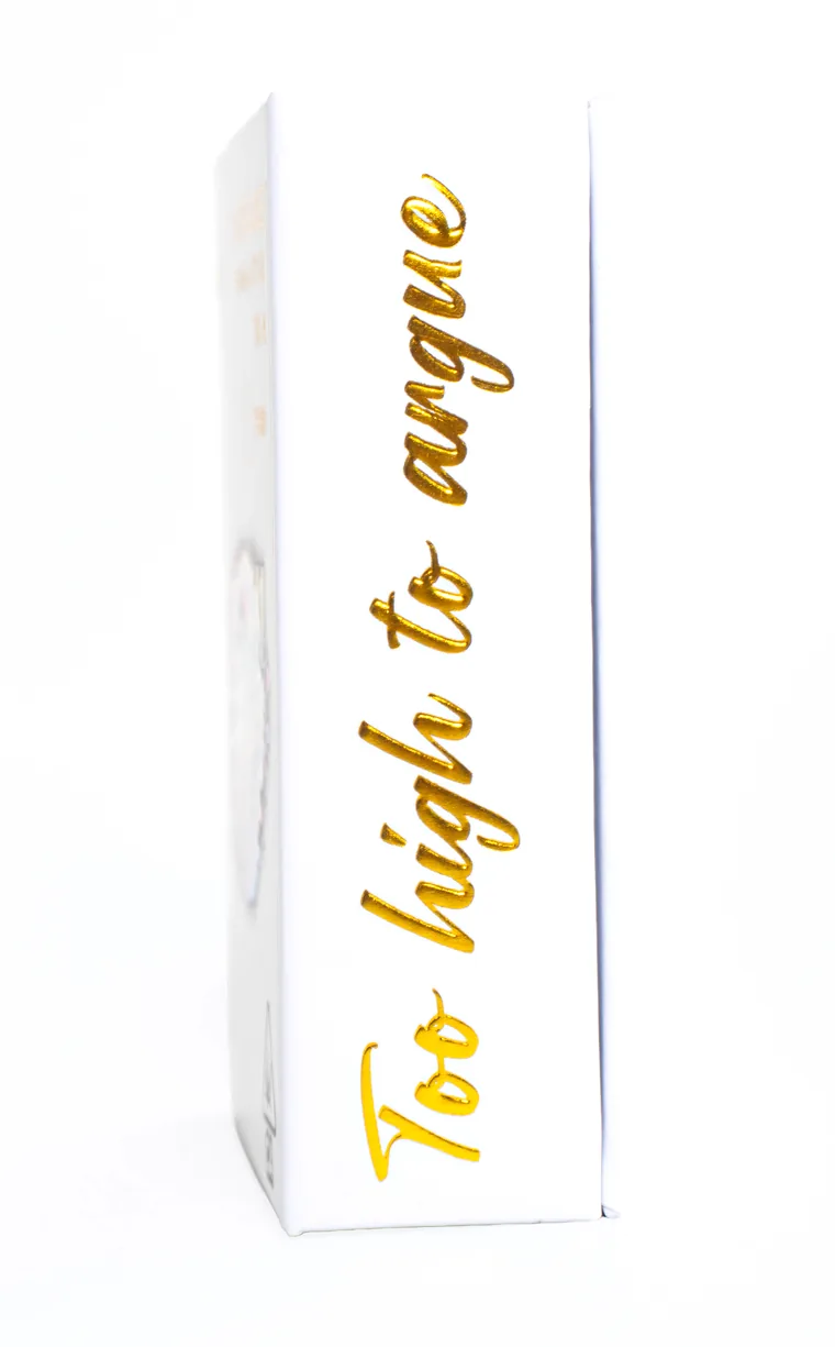 The gold foil script reading Too high to argue on the spine of a HaSheesh pack